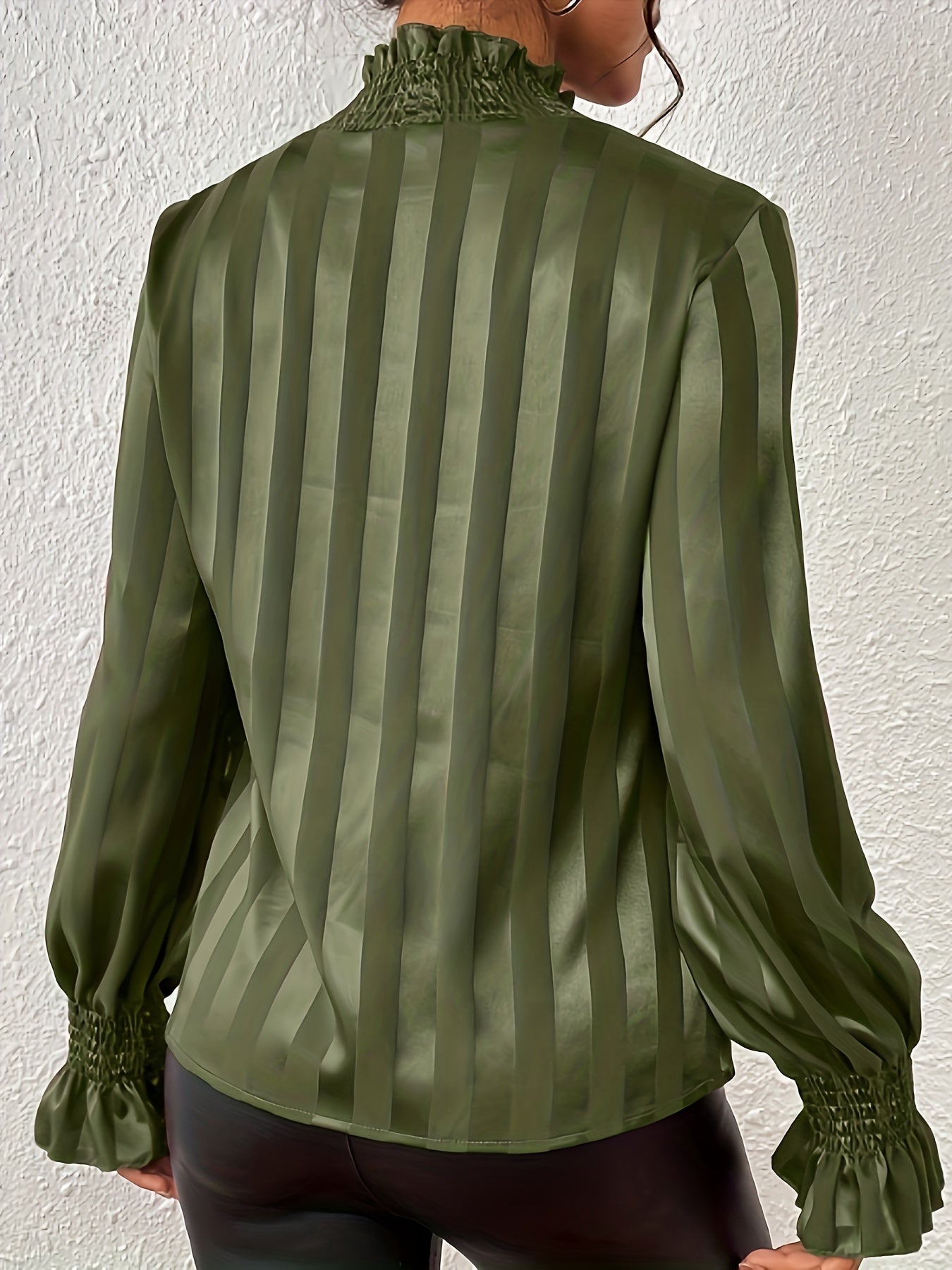 Olive striped satin blouse with ruffled cuffs close-up detail