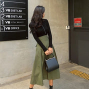 High-waisted skirt with bow detail olive green side view