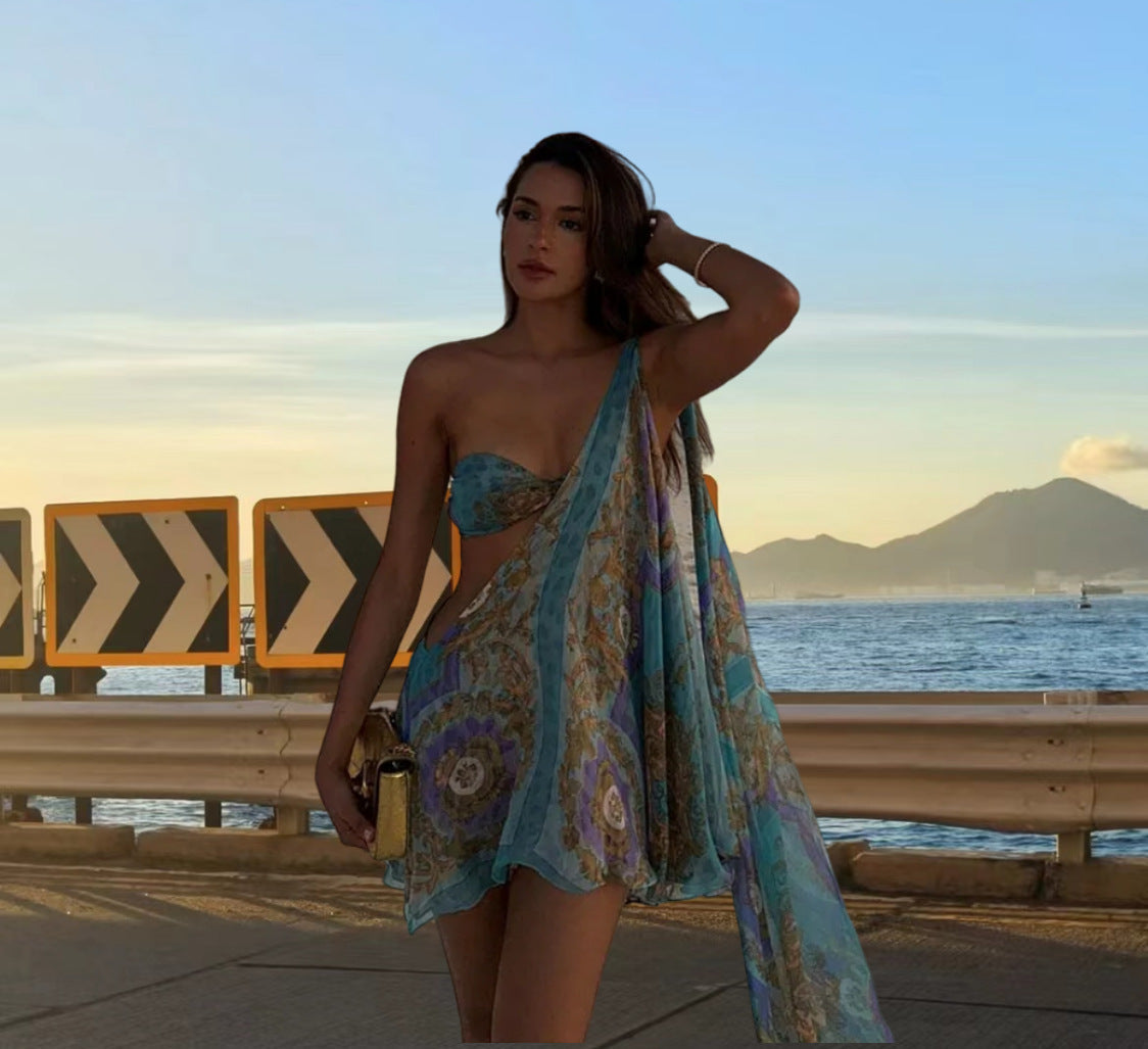 Blue patterned asymmetrical draped dress outdoor view