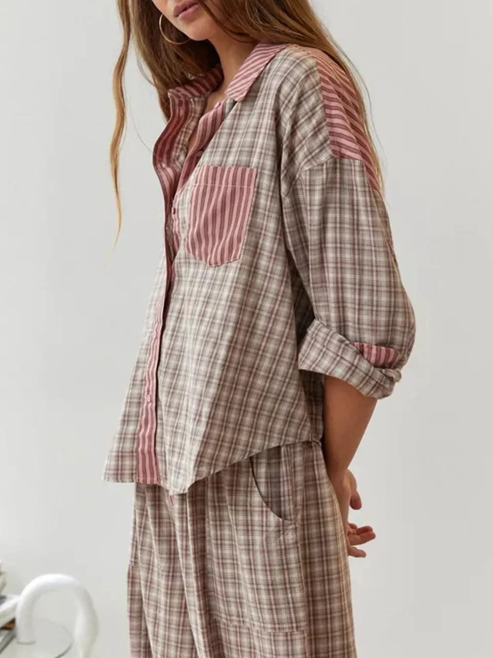 Pyjama set pink and brown checkered with striped accents side view