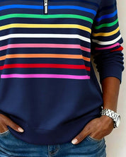 Navy sweatshirt with colorful stripes close-up waist view