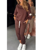 Brown loungewear set with drawstring and pocket detail front view
