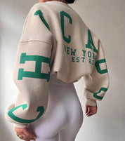 Trui wit groen print achterkant