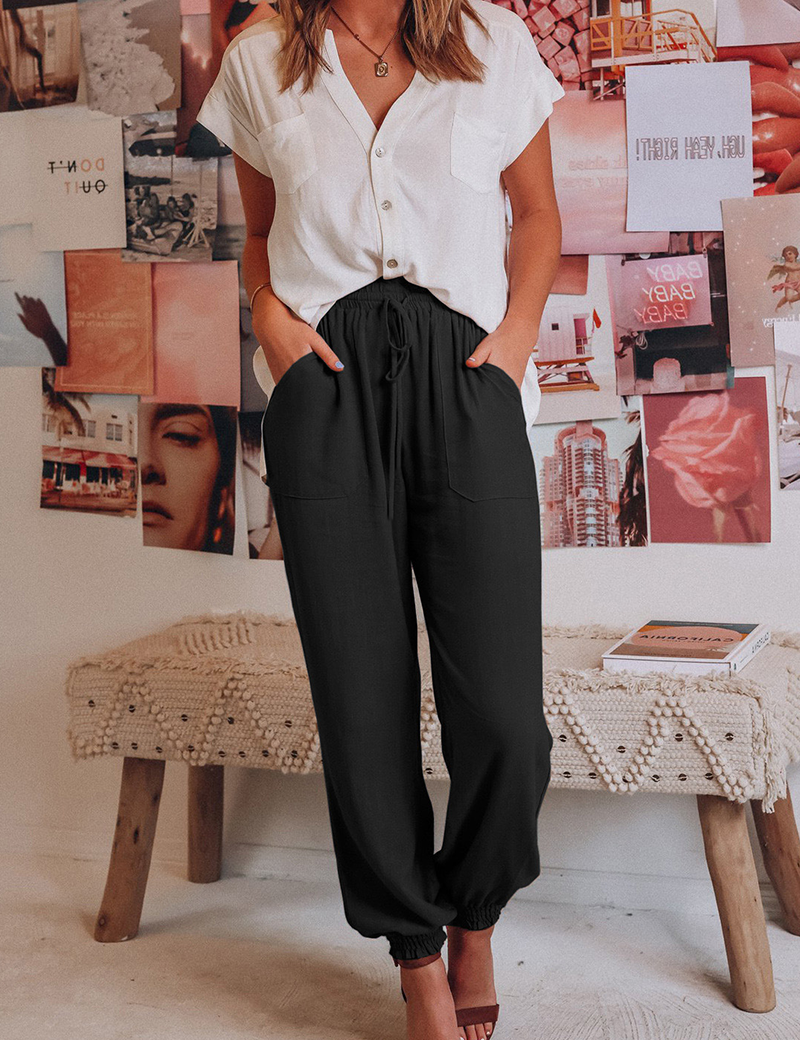 Zwarte damesbroek elastisch comfortabel met zakken vooraanzicht