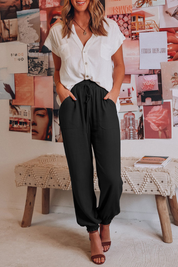 Zwarte damesbroek elastisch comfortabel met zakken vooraanzicht