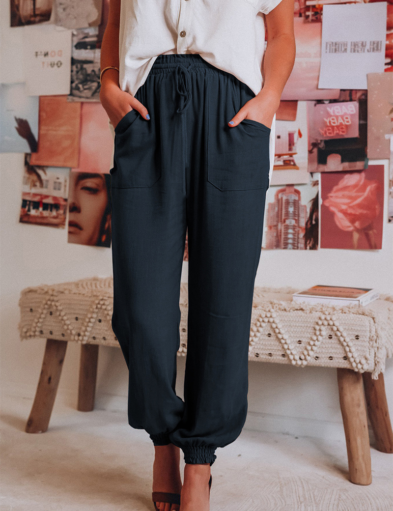 Zwart elastische damesbroek met zakken, front view