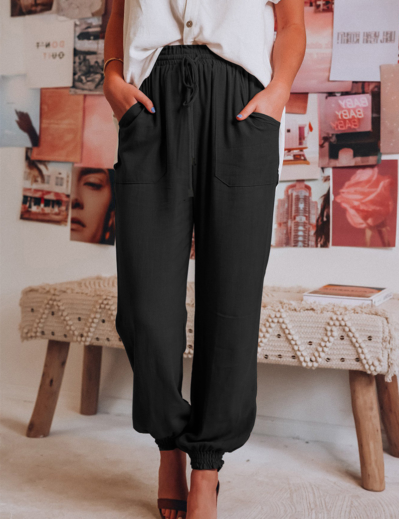 Zwarte elastische damesbroek met zakken, front view