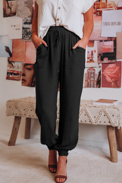 Zwarte elastische damesbroek met zakken, front view