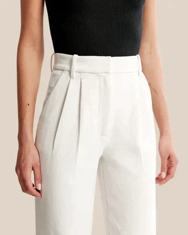 Wijde pijpen broek wit hoog model zijprofiel