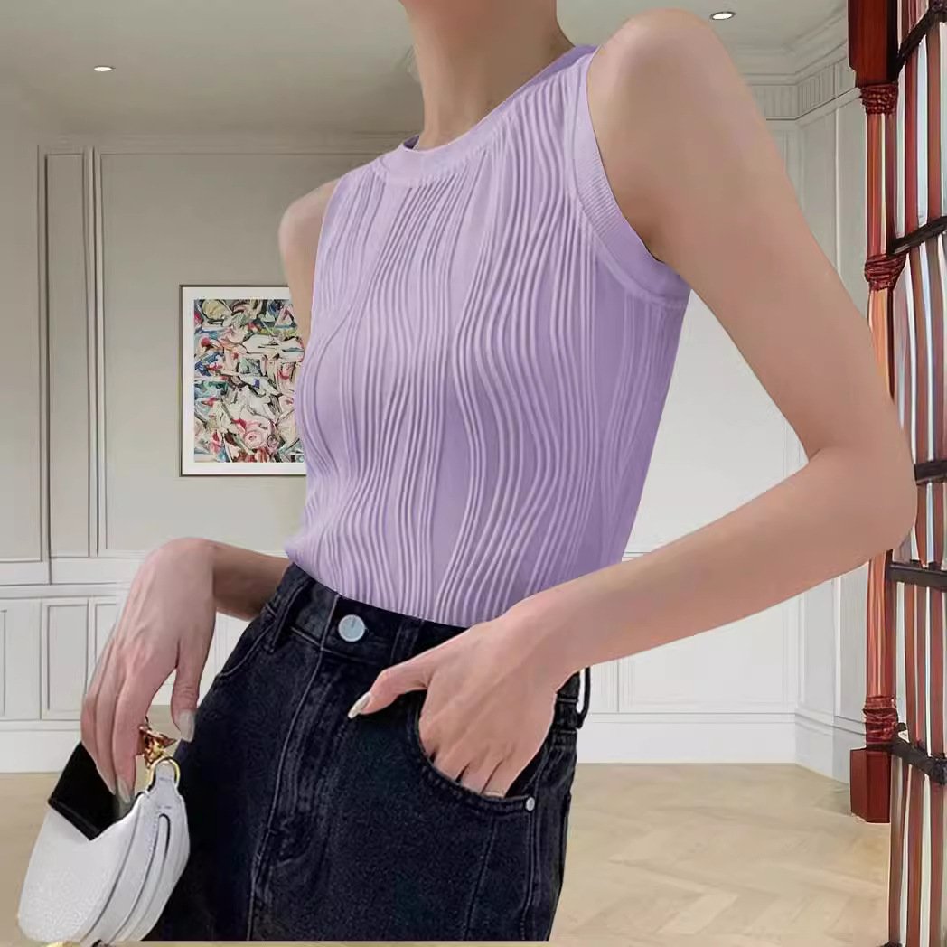 Purple ribbed sleeveless top with denim jeans front view