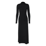 Black maxi dress with high collar and thigh-high slit, plain background