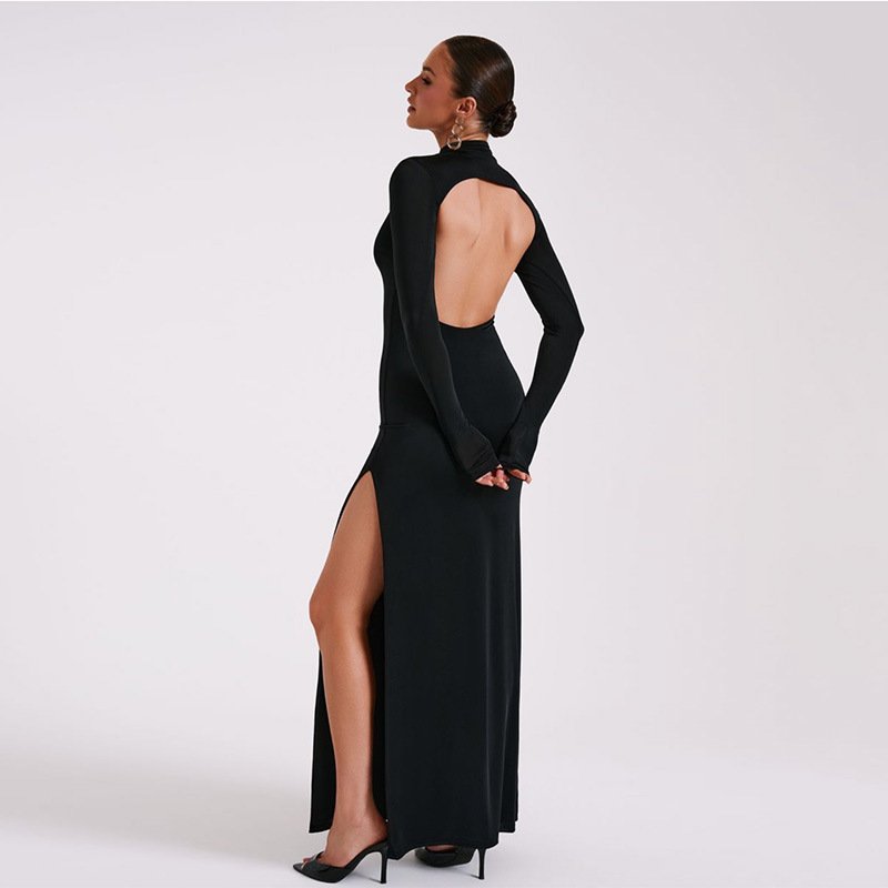 Black maxi dress with high collar and thigh-high slit, back view showing open back