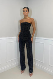 Strapless jumpsuit zwart met pailletten, front view