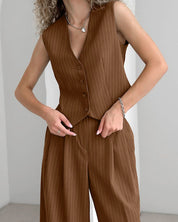 Brown pinstripe jumpsuit side profile