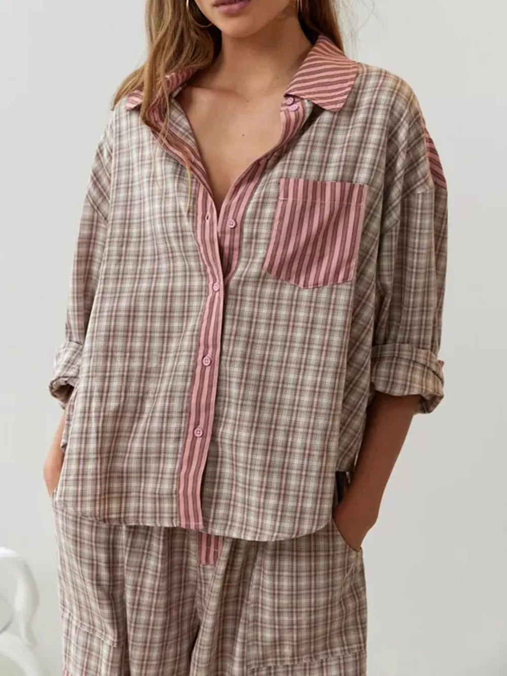 Pyjama set pink and brown checkered with striped accents front view
