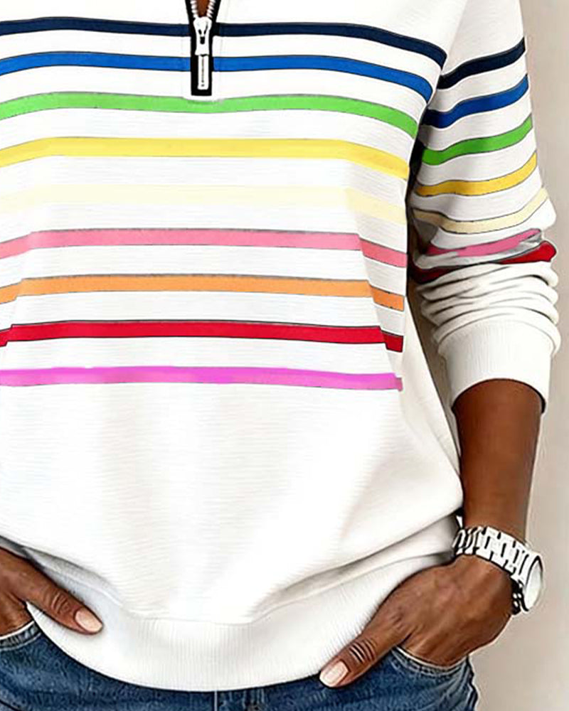 White sweatshirt with colorful stripes close-up waist view