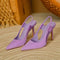 Lila slingback pumps met puntige neus en hoge hakken, detailopname
