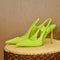 Slippers neon groen met puntige neus en hoge hakken vooraanzicht