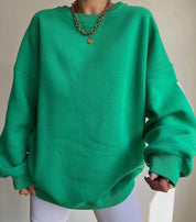 Oversized groene trui met ronde hals en losse pasvorm vooraanzicht