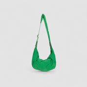 Schoudertas groen pufferstof met lange schouderriem