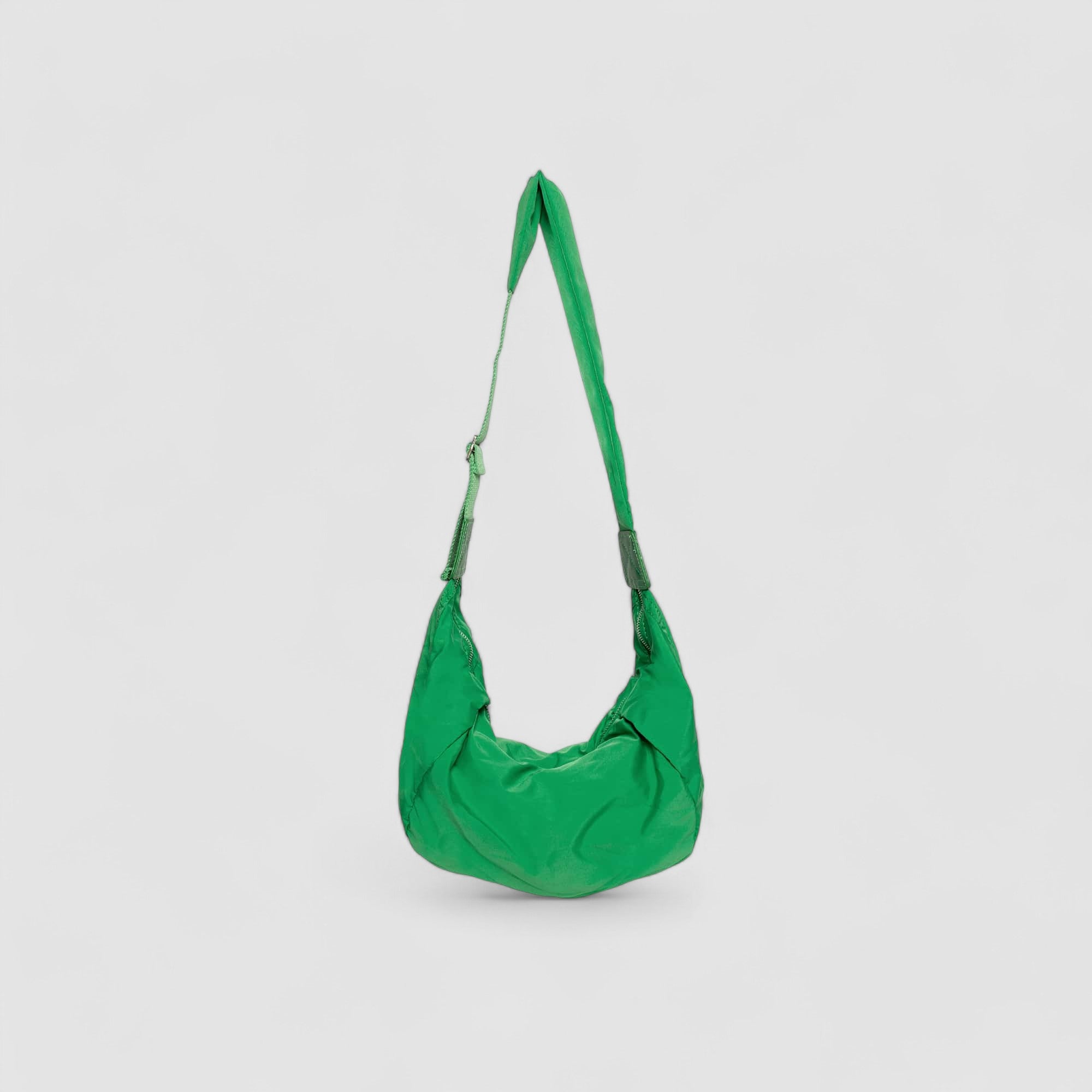 Schoudertas groen pufferstof met lange schouderriem