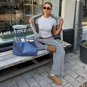 Wide-leg trousers blue and white striped three-quarter view