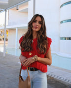 Red chunky knit vest with gold buttons front view
