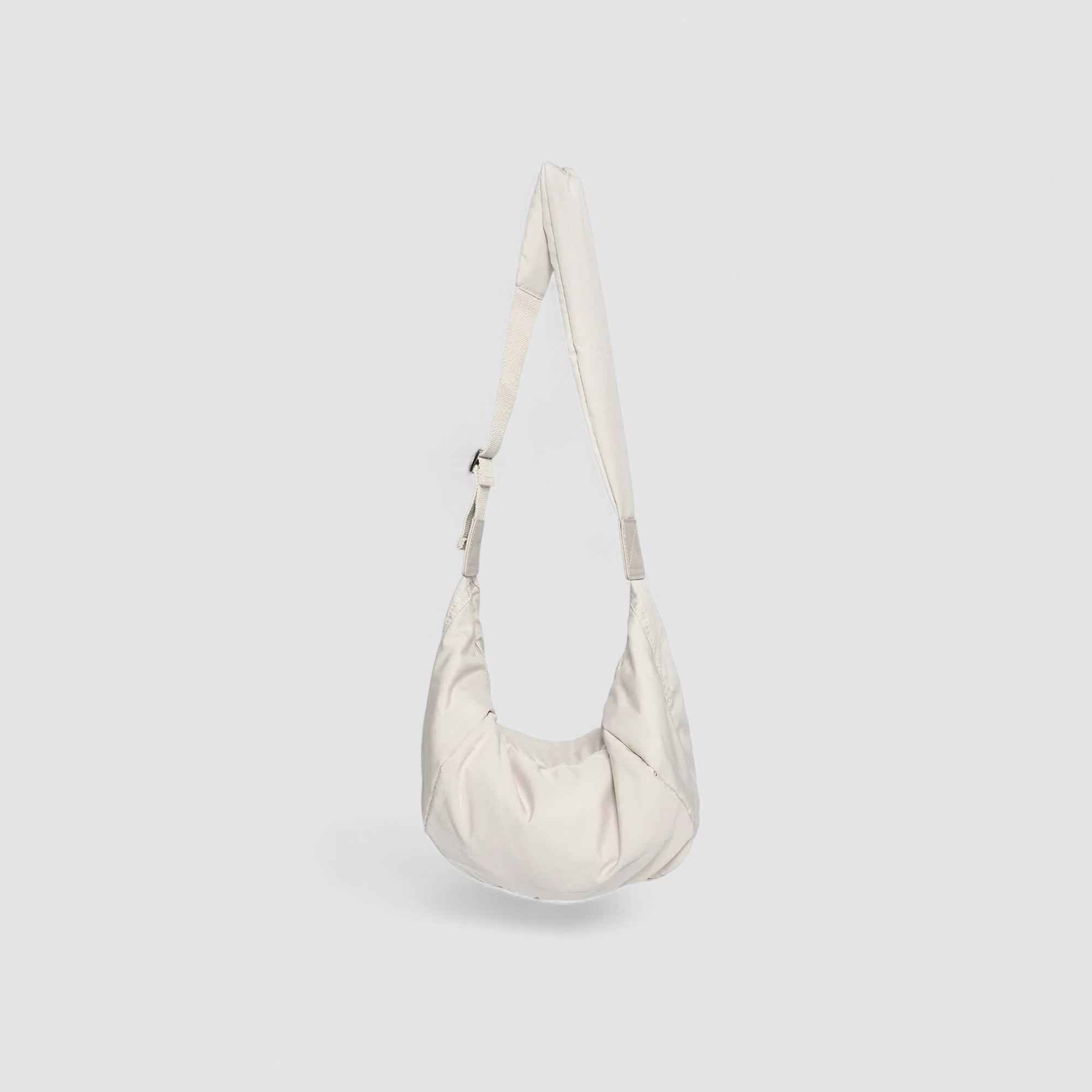 Schoudertas witte puffer stijl zijaanzicht