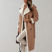 Trenchcoat camel with white shearling lining three-quarter view