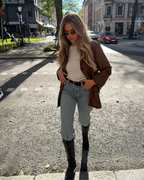 Brown suede-look blazer side view with model outdoors