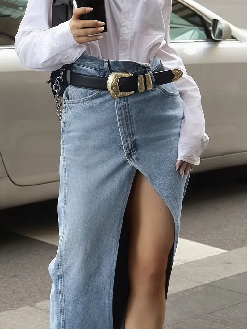 Light blue denim maxi skirt with high slit, street style close-up