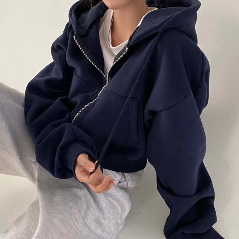 Navy zip-up hoodie with hood worn front view