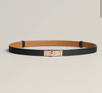 Black leather belt with gold buckle flat lay