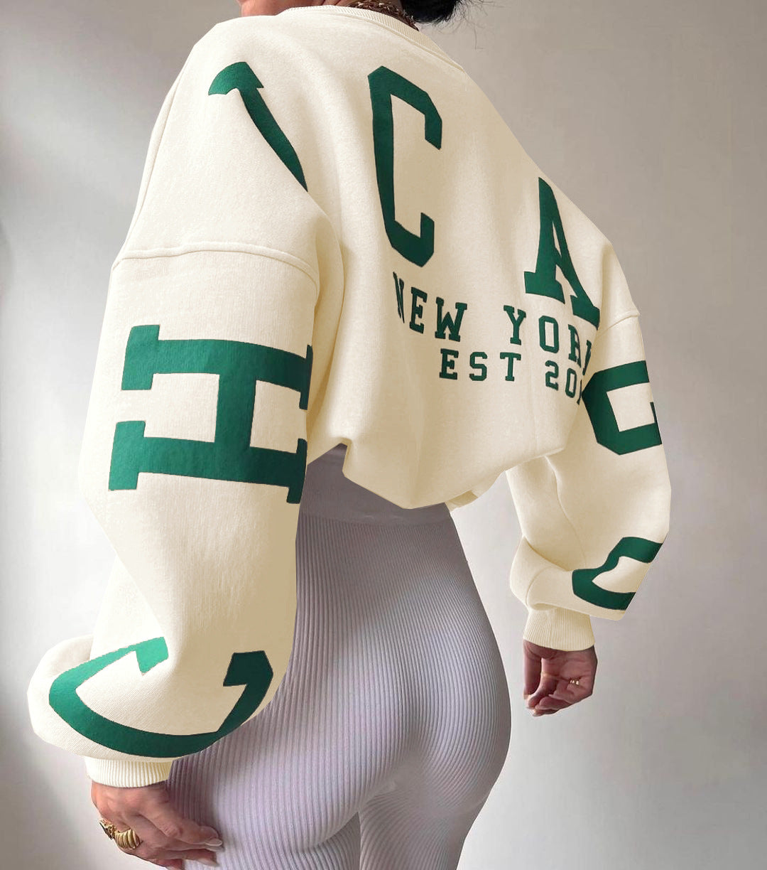 Trui oversize comfortabel wit met groene print achterzijde