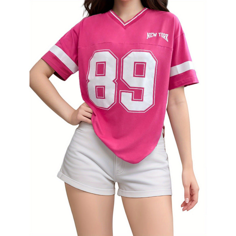 Pink v-neck t-shirt with '89' and 'New York' graphic, front view