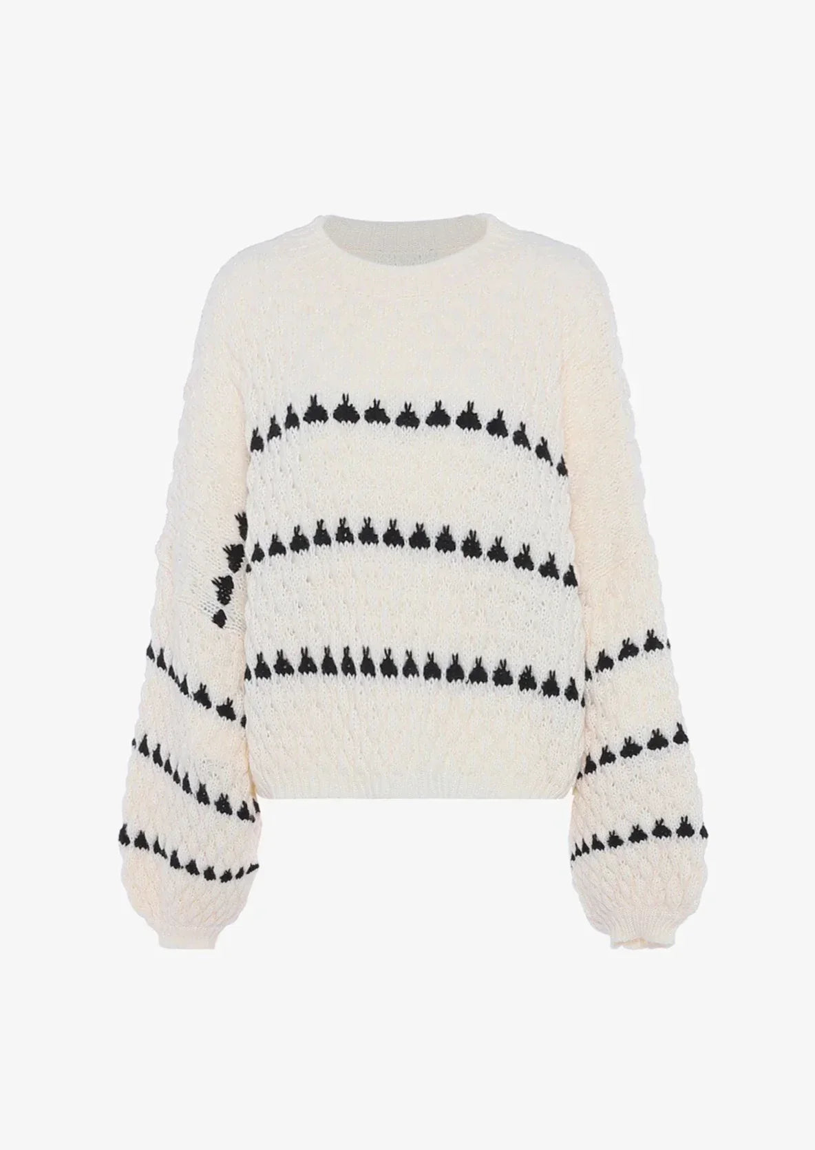 Cream chunky knit sweater with black heart pattern, front view on mannequin