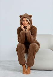 Brown fuzzy onesie with bear ears seated view