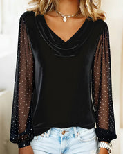 Black blouse with polka dot sleeves and cowl neck side view