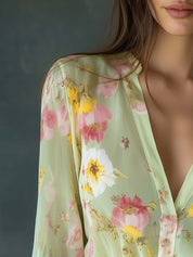 Chiffon blouse with floral print, light green, close-up of neckline