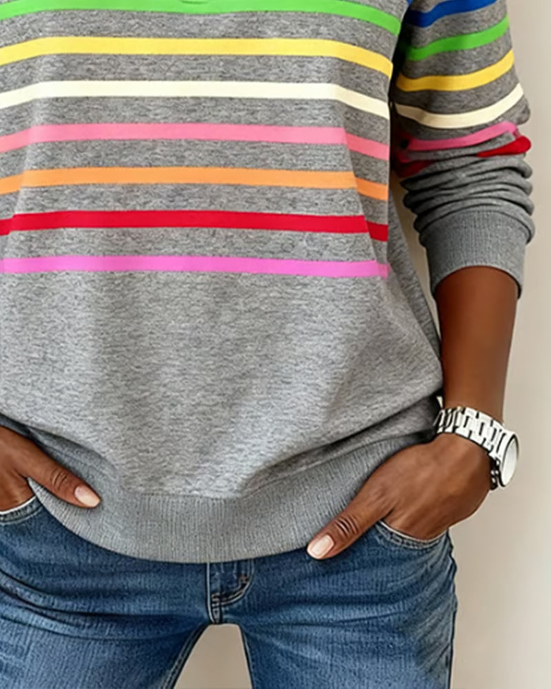 Gray sweatshirt with colorful stripes close-up waist view