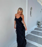 Zomerjurk zwart met ruches, zijprofiel