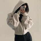 White zip-up hoodie with hood worn front view