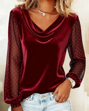 Red blouse with polka dot sleeves and cowl neck front view