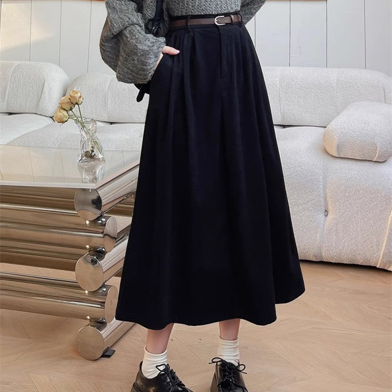 Midi skirt black color indoor view with belt