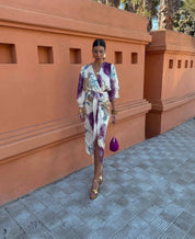 Silk dress with abstract print and deep V-neck full-body view