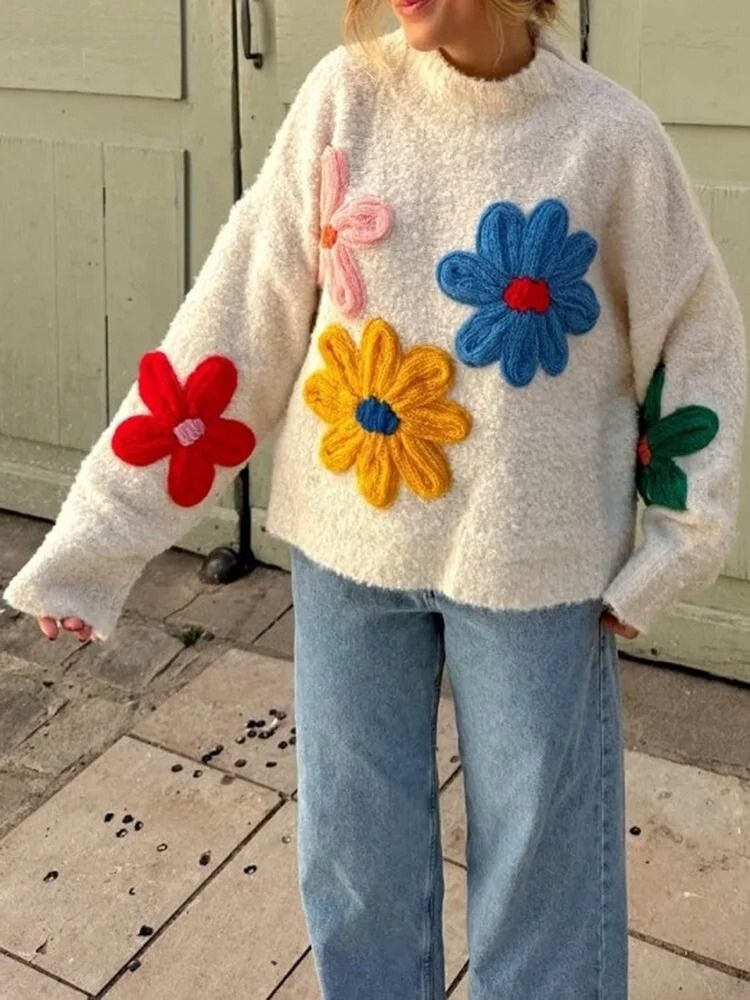 Cream knit sweater with vibrant floral appliques full body view