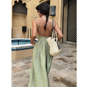 Midi dress light green back view with thin straps