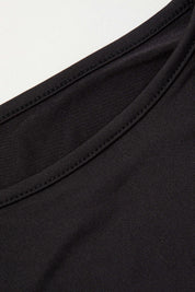 Black long-sleeve crop top hem detail