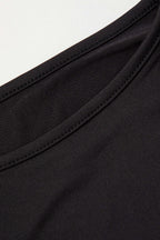 Black long-sleeve crop top hem detail
