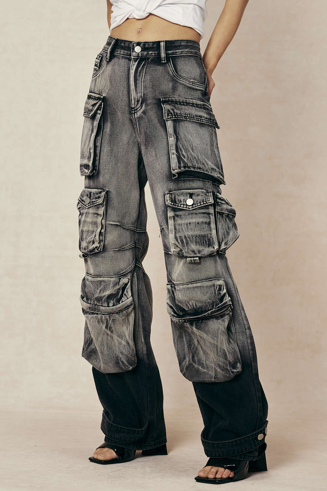 Cargo jeans model front view dark wash hands in pockets